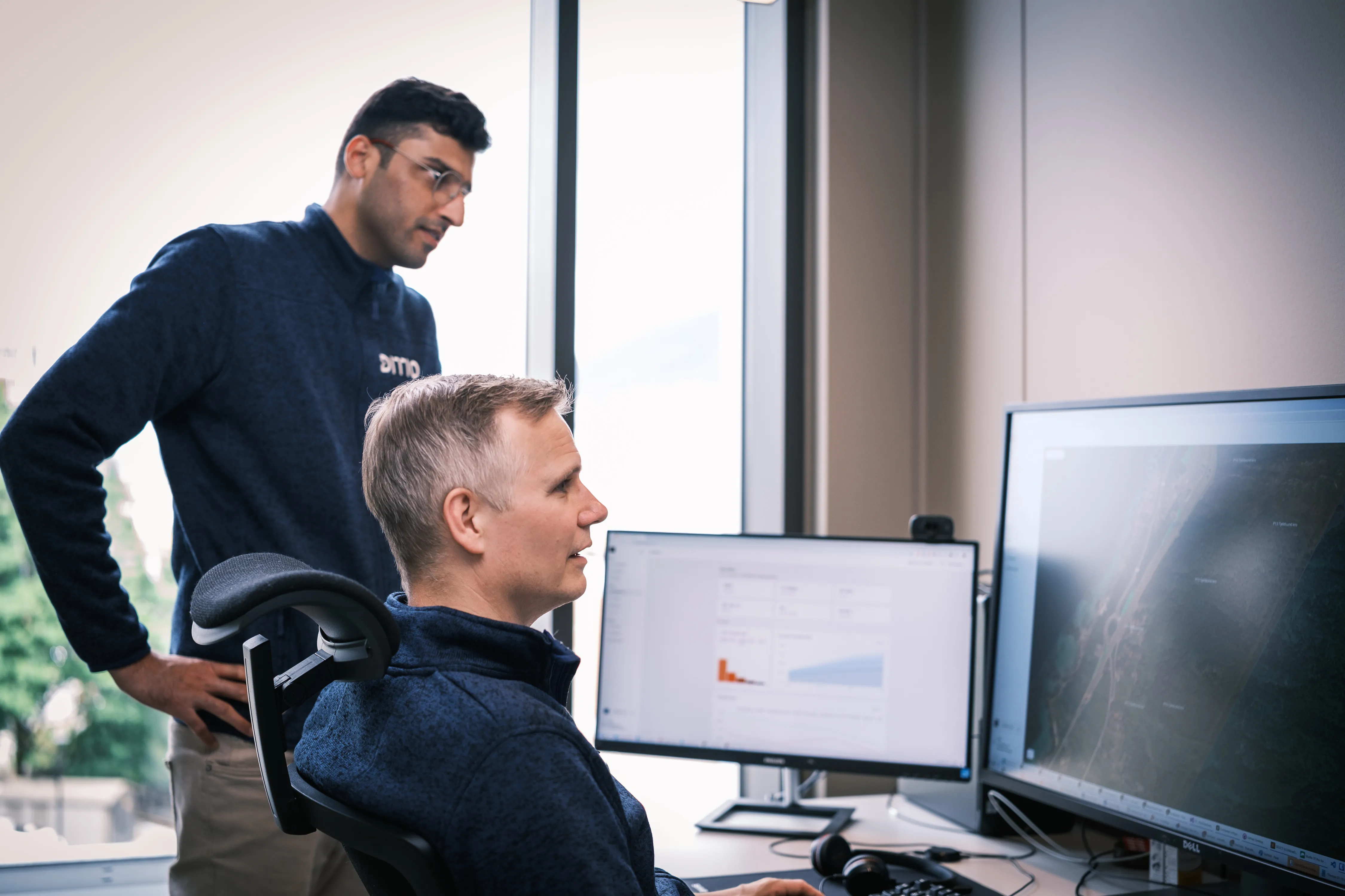 Ditio team members working with the platform