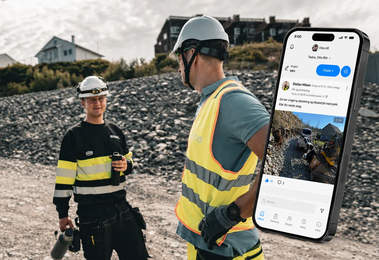 Two field workers on site – the phone shows the Ditio feed with a diary post